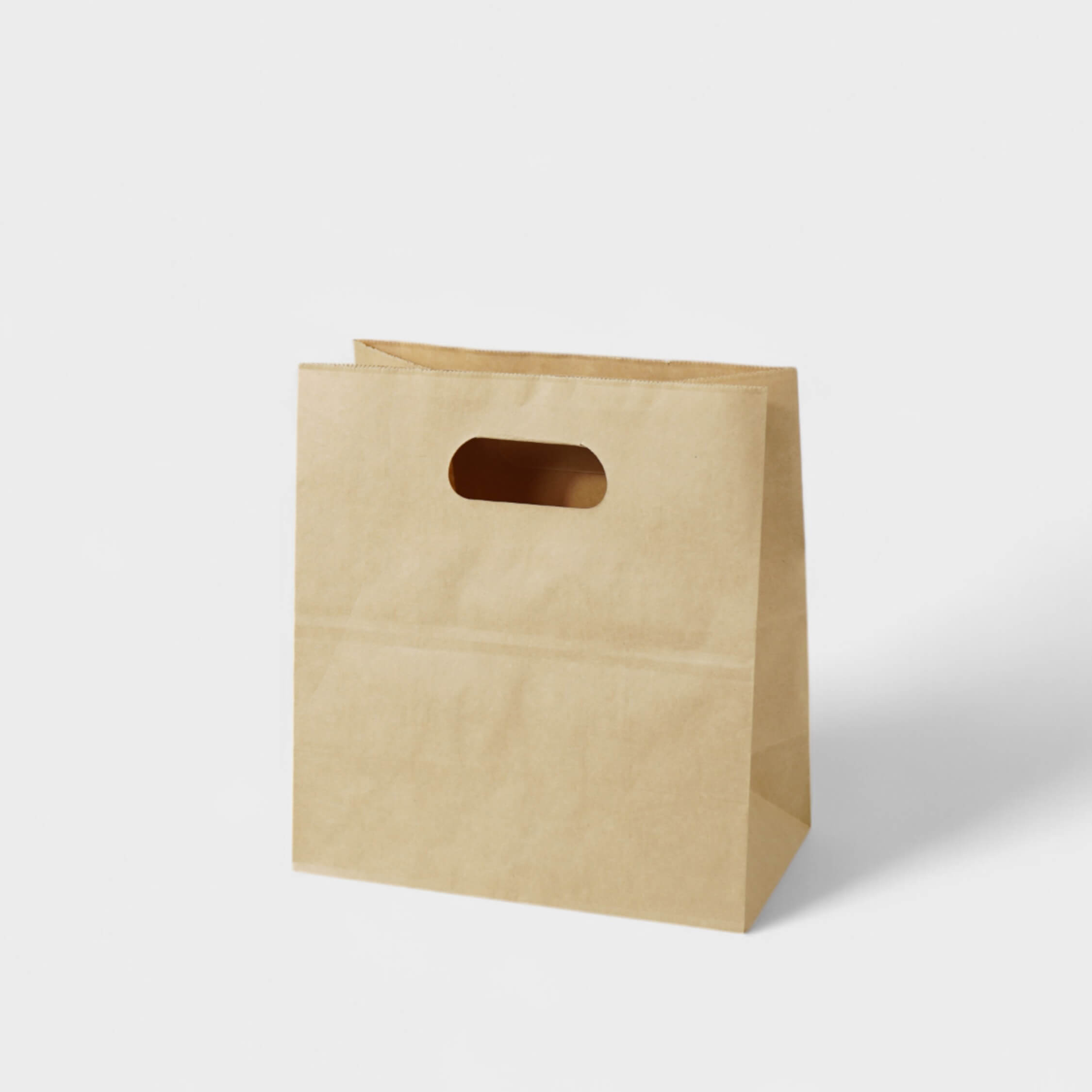 Natural Kraft Die-Cut Handle Takeout Bag - image 1